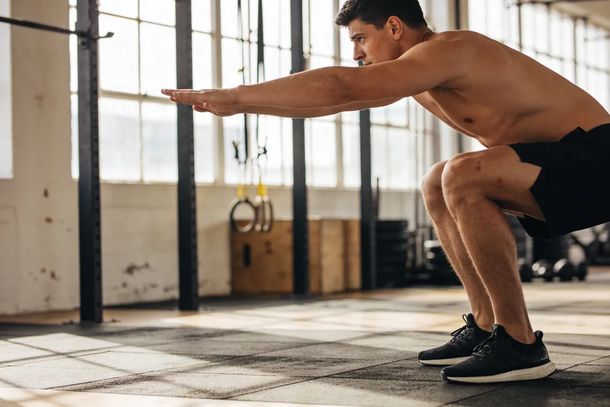 Douleur lombaire squat : 6 causes et solutions préventives ! - article bien-etre Gym Studio